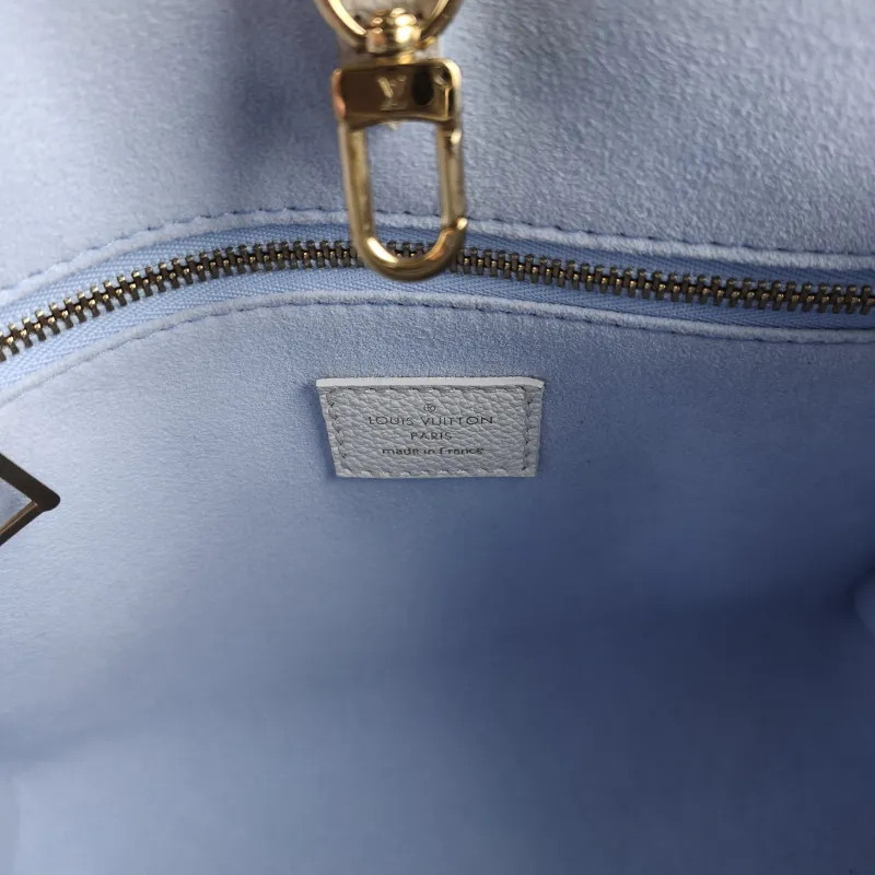 Louis Vuitton Shoulder Bag Onthego White · Blue Monogram Empreinte Embossed Calfskin Small 25 × 11.5 × 19 cm — detail view 1 of 11