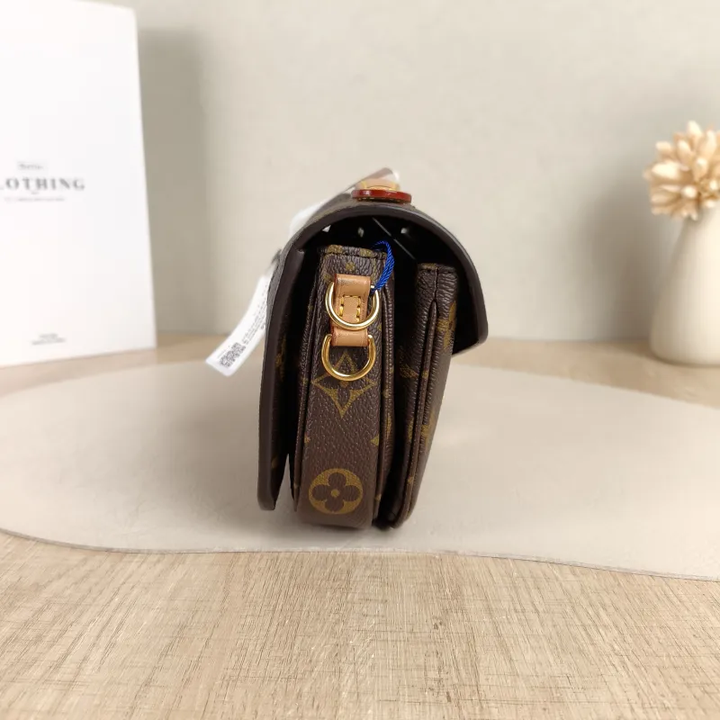 Louis Vuitton Crossbody Bag Pochette Métis East West Monogram PVC Small21.5 × 6 × 13.5 cm — detail view 1 of 14