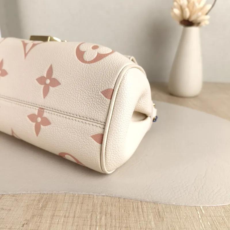 Louis Vuitton Crossbody Bag Favorite White · Pink Empreinte Embossed Calfskin Medium 24 × 9 × 14 cm — detail view 5 of 11