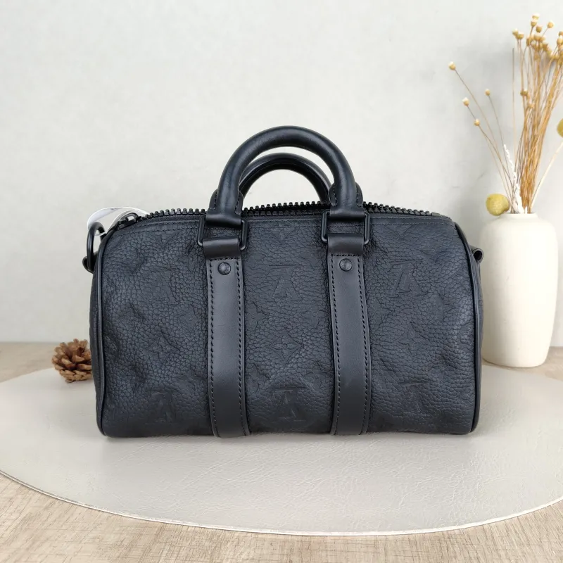 Louis Vuitton Crossbody Bag Keepall 25 Taurillon Embossed Calfskin Monogram Medium25 × 11 × 15 cm — cover view 3 of 5