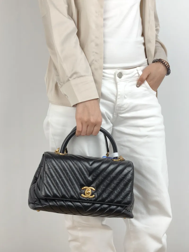 Chanel Top Handle Bag Coco Handle​ v Black Waxed Leather Calfskin Medium 29 × 12 × 18 cm 26 — on-model view 2 of 2