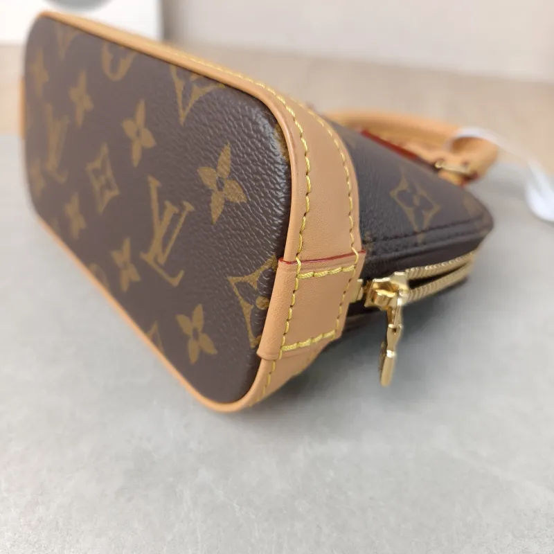 Louis Vuitton Crossbody Bag Alma Nano Monogram PVC nano 18 × 8 × 12 cm — detail view 2 of 10