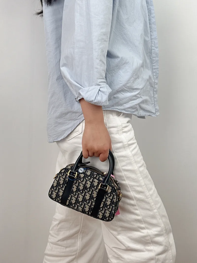 DIOR Crossbody Bag D-Vibe East-West Bowling Bag Blue Canvas Mini 20.5 × 7 × 12 cm — on-model view 2 of 2