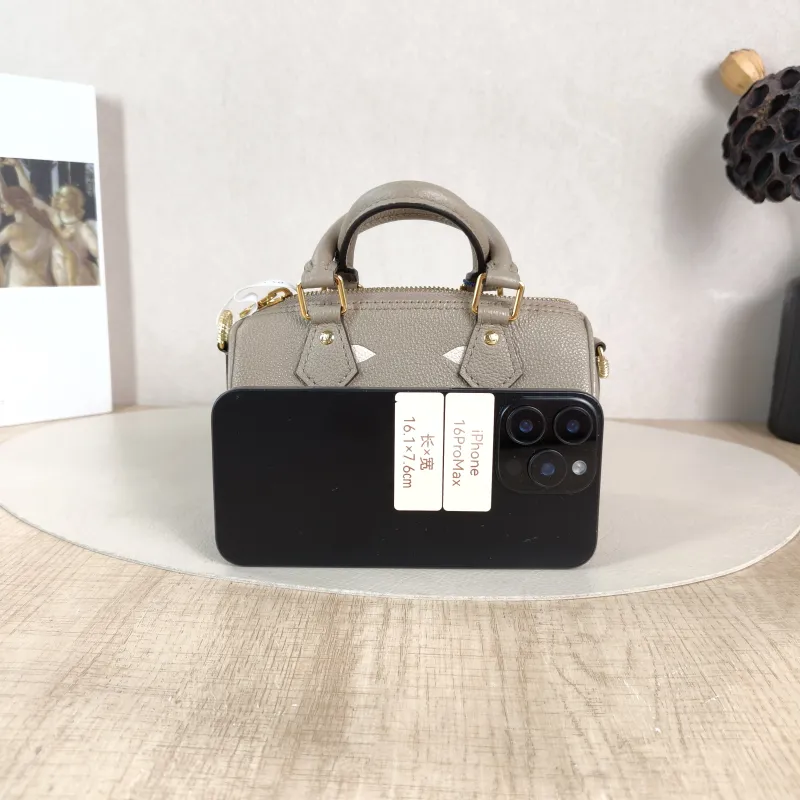 Louis Vuitton Crossbody Bag Speedy Nano · White Monogram Empreinte Embossed Calfskin nano 16 × 7.5 × 10 cm — cover view 4 of 6