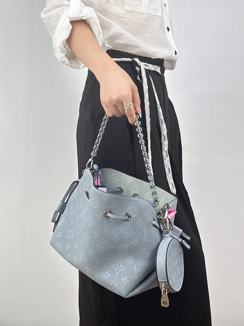 Louis Vuitton Crossbody Bag BELLA Calfskin One Size22 × 14 × 19 cm — on-model view 1 of 2