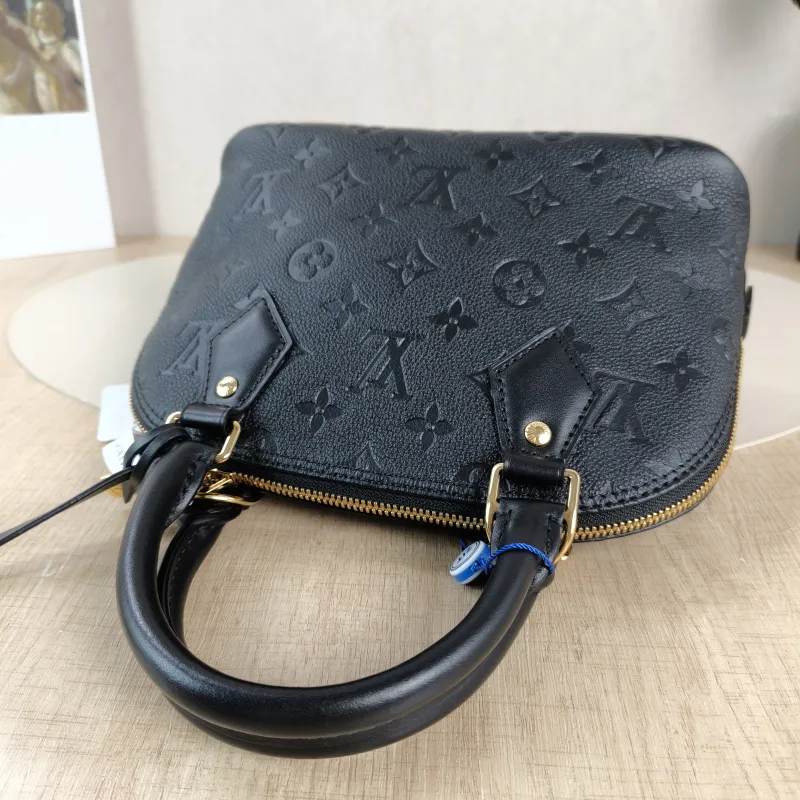 Louis Vuitton Top Handle Bag Alma BB Black Calfskin BB 23.5 × 11.5 × 17.5 cm — detail view 9 of 11