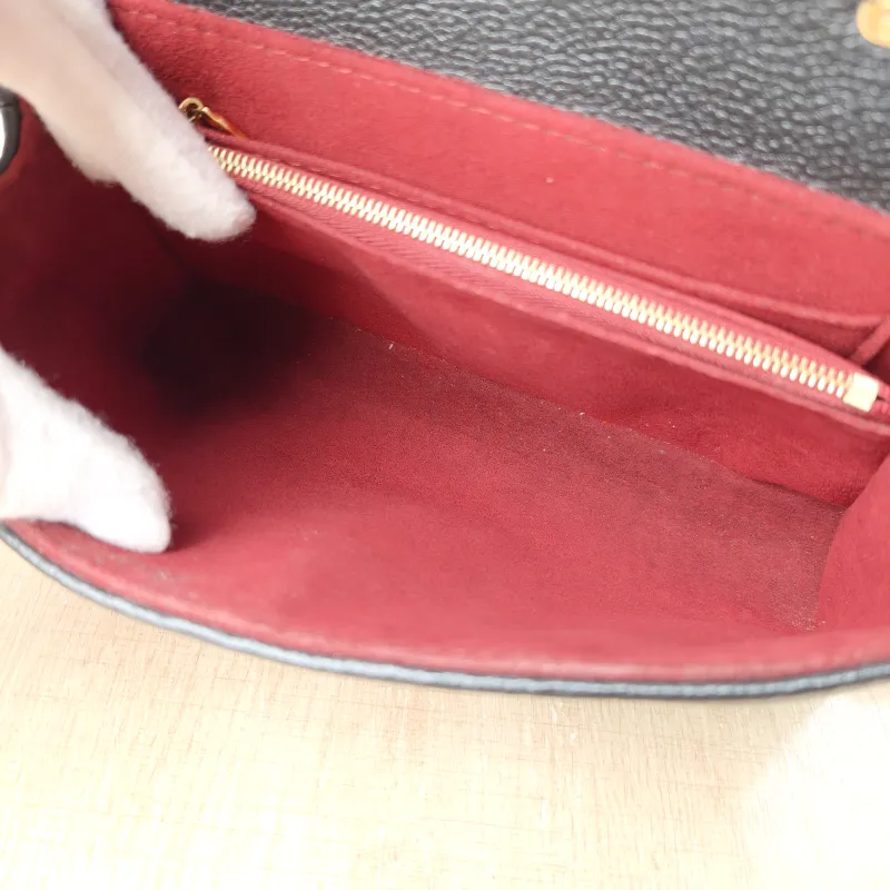 Louis Vuitton Crossbody Bag MADELEINE Black · White Monogram Empreinte Embossed Calfskin BB 24 × 8.5 × 17 cm — detail view 12 of 13
