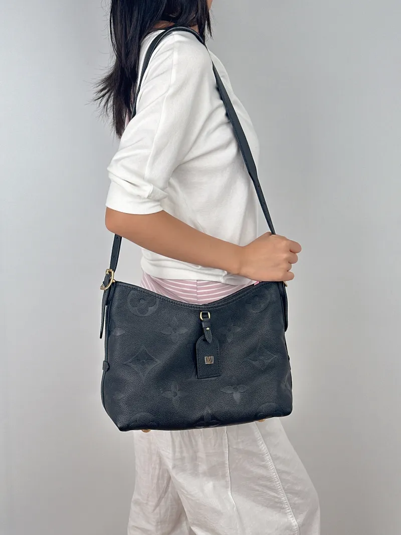 Louis Vuitton Crossbody Bag Carryall Black Calfskin Small29.5 × 12 × 24 cm — on-model view 1 of 2
