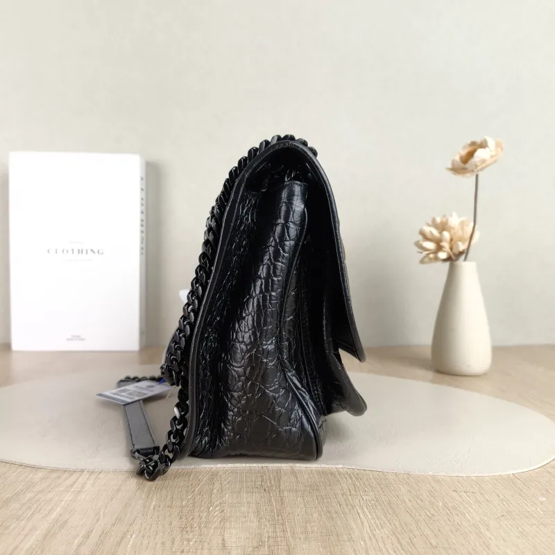 SAINT LAURENT Crossbody Bag Niki Black Waxed Leather Calfskin Medium 28 × 8.5 × 20 cm — detail view 2 of 12