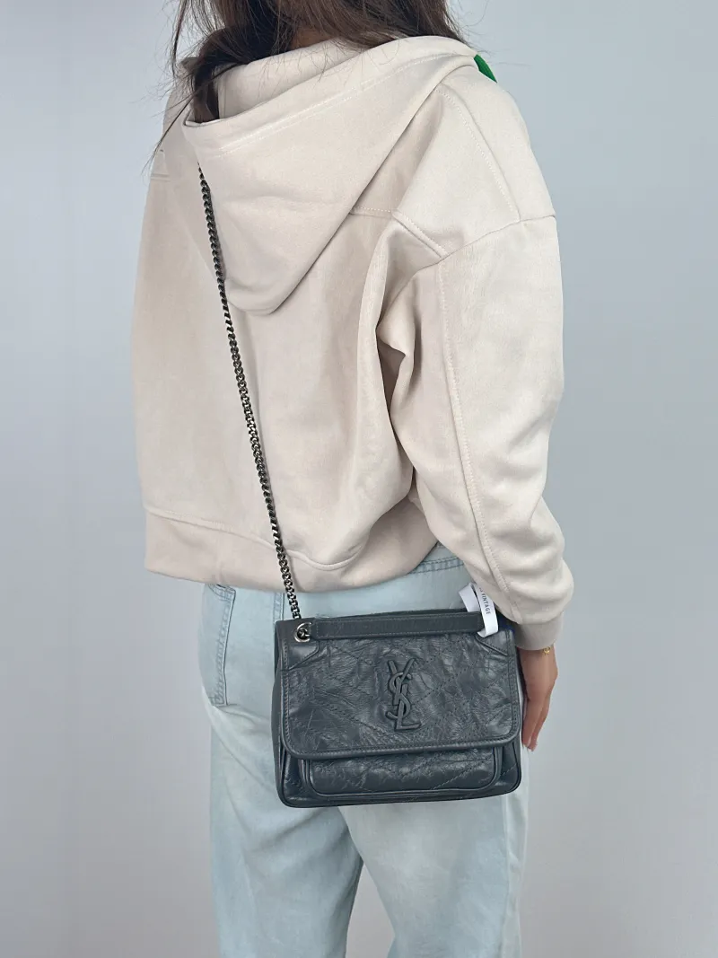 SAINT LAURENT Crossbody Bag Niki D Dark Grey Waxed Leather Calfskin Small 21 × 7.5 × 16 cm — on-model view 2 of 2