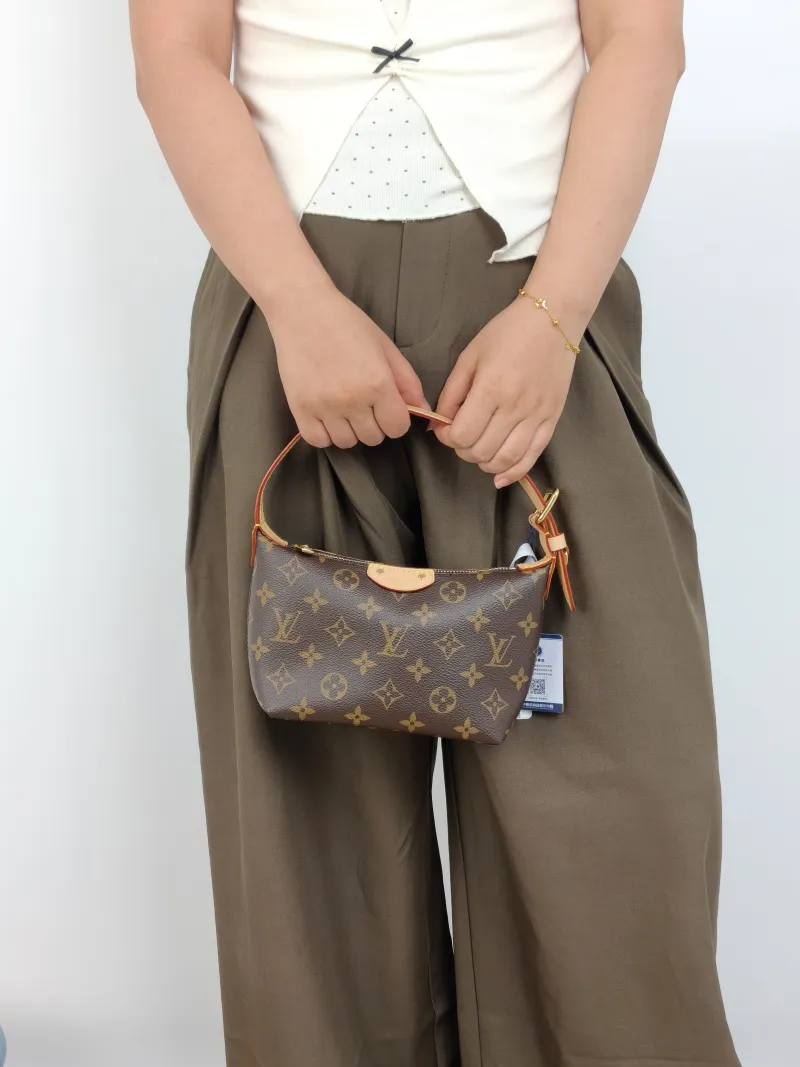 Louis Vuitton Shoulder Bag Pochette Hills Monogram PVC One Size 18.5 × 6.5 × 11 cm — on-model view 2 of 2