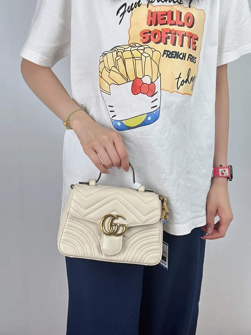 GUCCI Crossbody Bag GG Marmont Marmont White Calfskinmini21 × 8 × 15.5 cm — on-model view 2 of 2