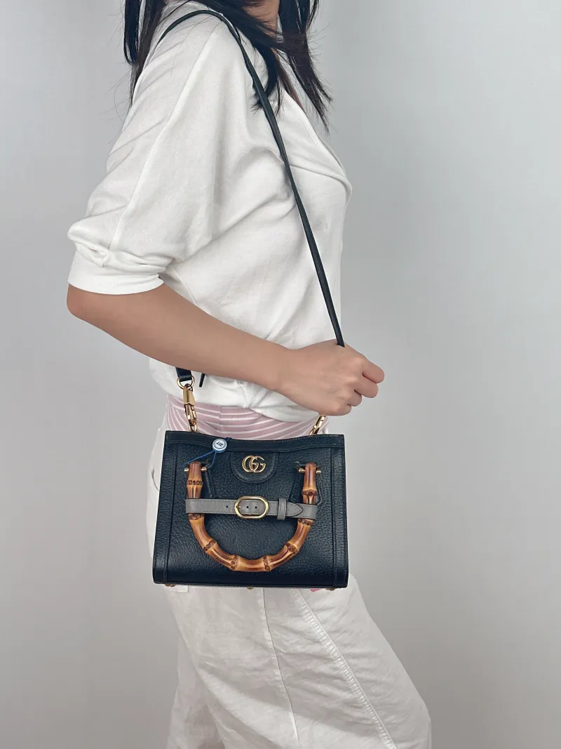 GUCCI Top Handle Bag Diana Top Handle Bag Black CC alfskin Small 20 × 10 × 16 cm — on-model view 1 of 3