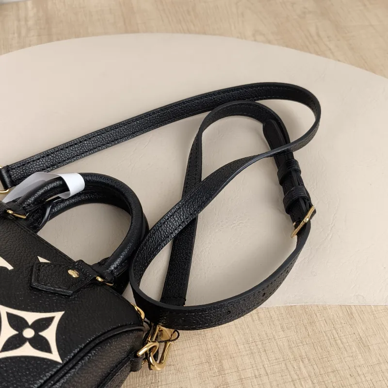 Louis Vuitton Crossbody Bag Speedy Nano Black · White Empreinte Embossed Calfskin Monogramnano16 × 7.5 × 10 cm — detail view 8 of 11