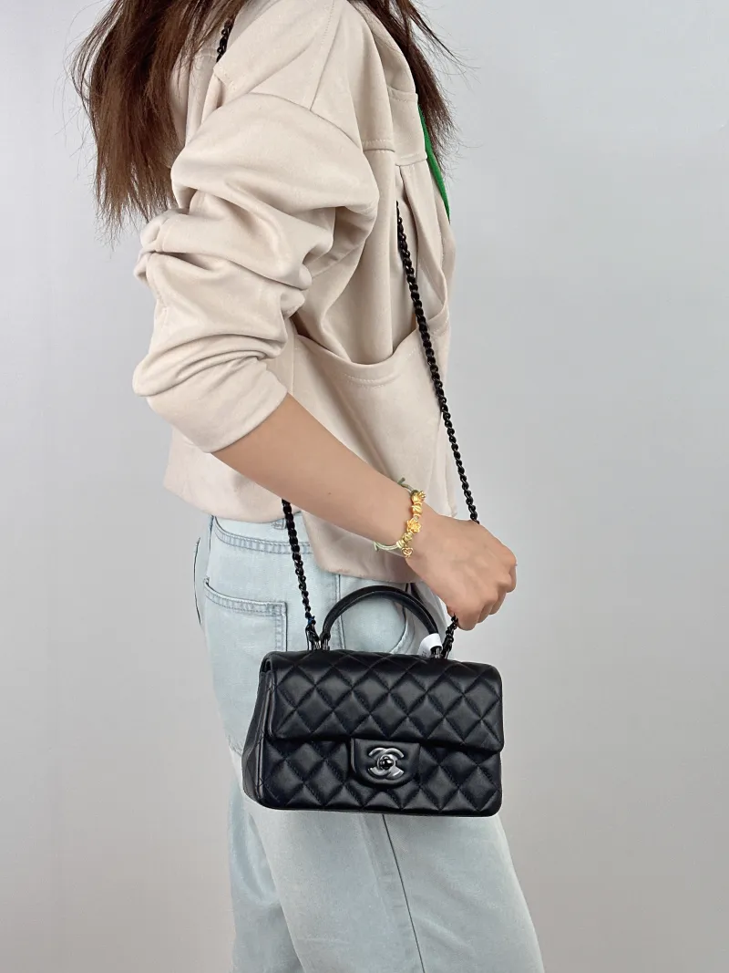 Chanel Crossbody Bag mini Black Lambskin mini 20 × 6 × 12 cm — on-model view 2 of 3
