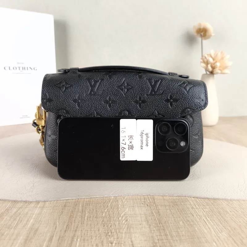 Louis Vuitton Crossbody Bag Pochette Métis East West Black Empreinte Embossed Calfskin Small 21.5 × 6 × 13.5 cm — cover view 5 of 5