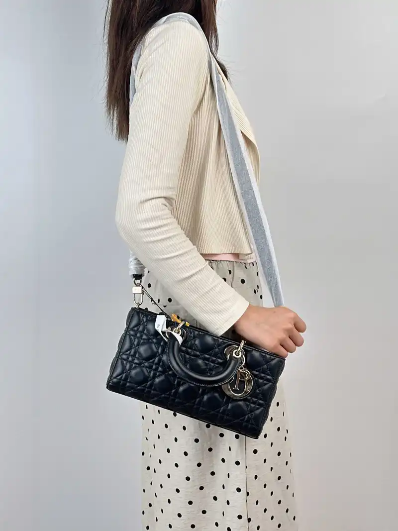 DIOR Crossbody Bag Lady D-Joy Black Lambskin Medium26 × 5 × 13.5 cm — on-model view 2 of 3