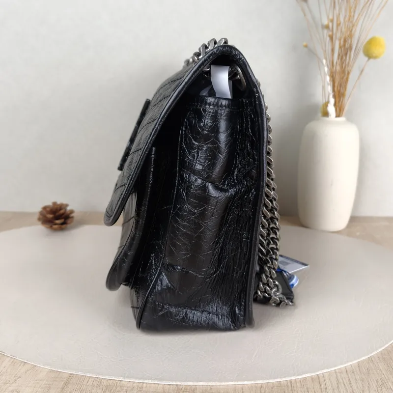 SAINT LAURENT Crossbody Bag Niki Black Waxed Leather Calfskin Medium 28 × 8.5 × 20 cm — detail view 13 of 14