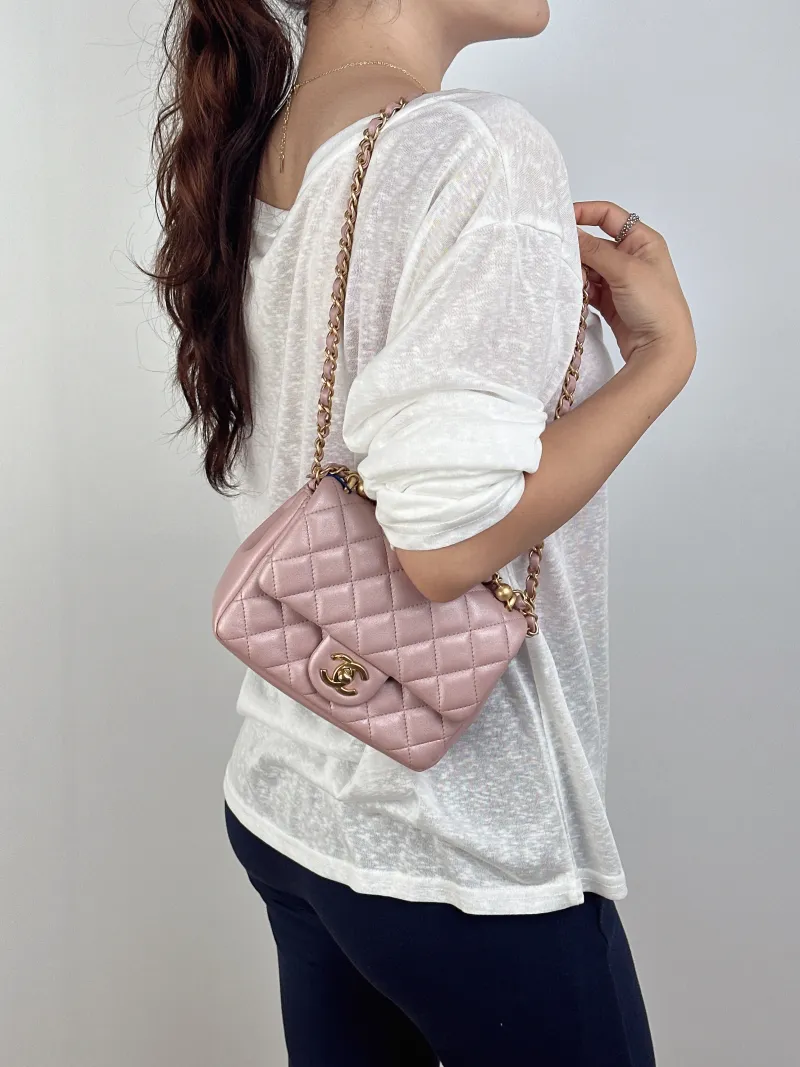 Chanel Crossbody Bag24p Pearl Pink Lambskinmini17 × 5 × 13 cm — on-model view 1 of 3