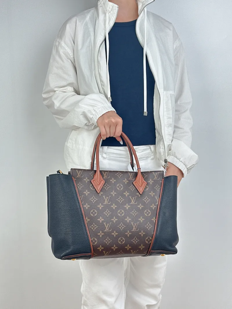Louis Vuitton Top Handle Bag W Tote Black · Monogram PVC · Calfskin One Size35 × 11 × 25 cm — on-model view 1 of 2