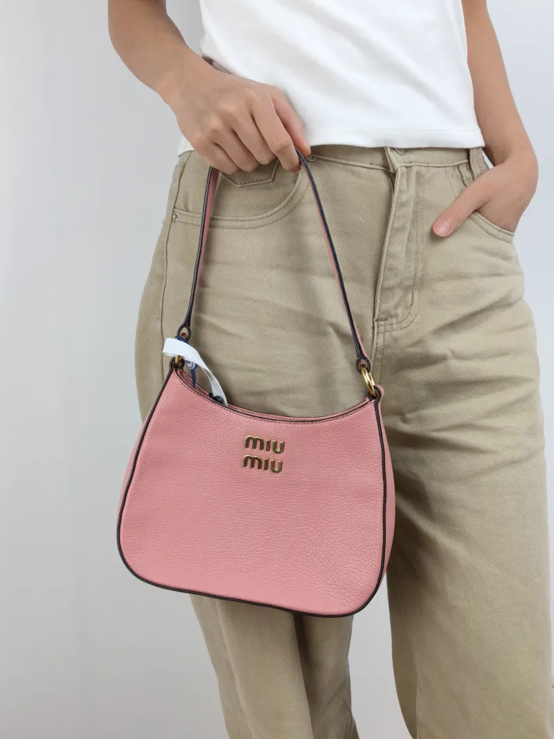 Miumiu Shoulder Bag Shoulder Bag Pink Calfskin 22 × 5 × 17 cm — on-model view 1 of 2