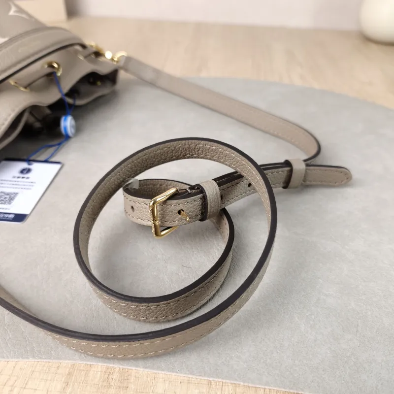 Louis Vuitton Crossbody Bag NANO NOÉ Bucket Bag Nano · White Monogram Empreinte Embossed Calfskin nano 13 × 10 × 16 cm — detail view 10 of 10