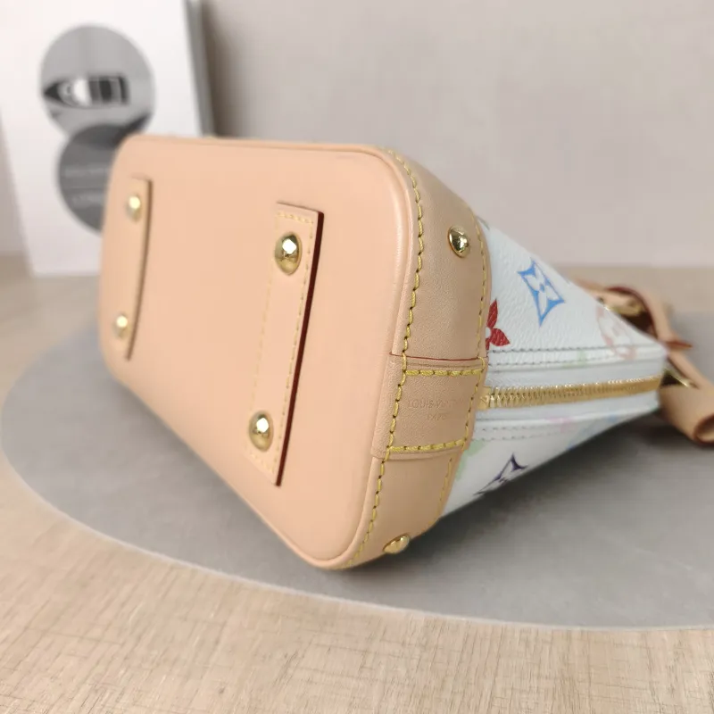 Louis Vuitton Crossbody Bag Alma BB Multicolore PVCBB23.5 × 11.5 × 17.5 cm — detail view 1 of 13