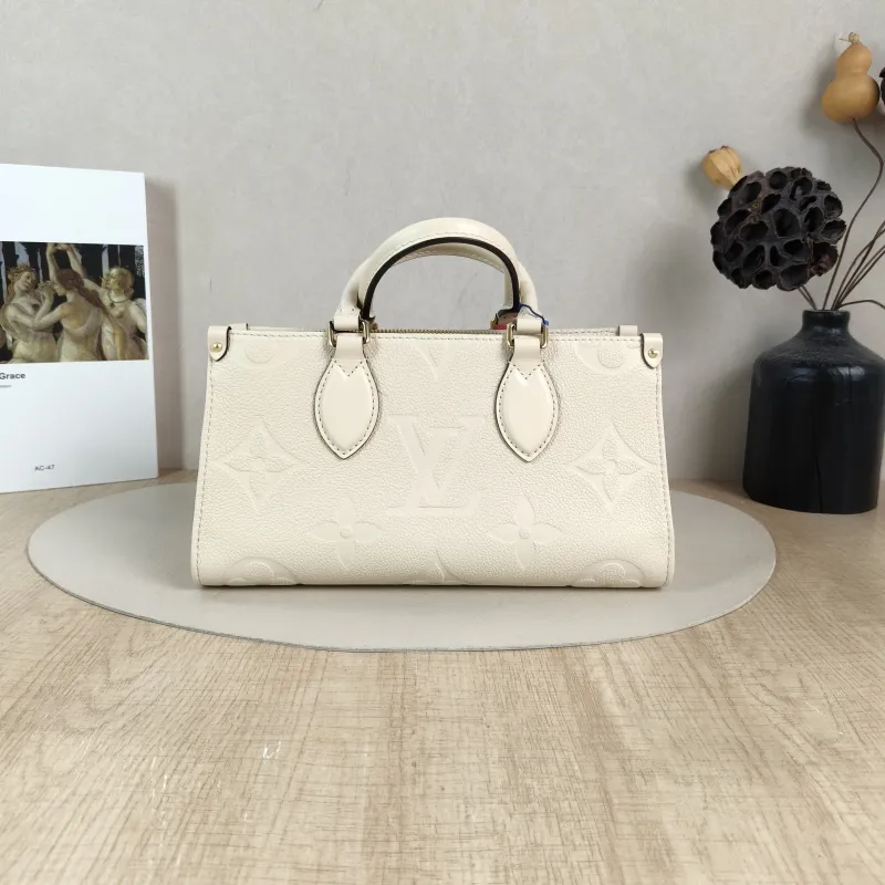 Louis Vuitton Crossbody Bag Onthego East West Two Straps White Empreinte Embossed Calfskin Small 25 × 10 × 13 cm