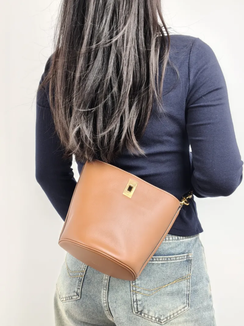 CELINE Crossbody Bag Teen Bucket 16 Bucket Bag Caramel Calfskin Small 16 × 16 × 18 cm — on-model view 2 of 3