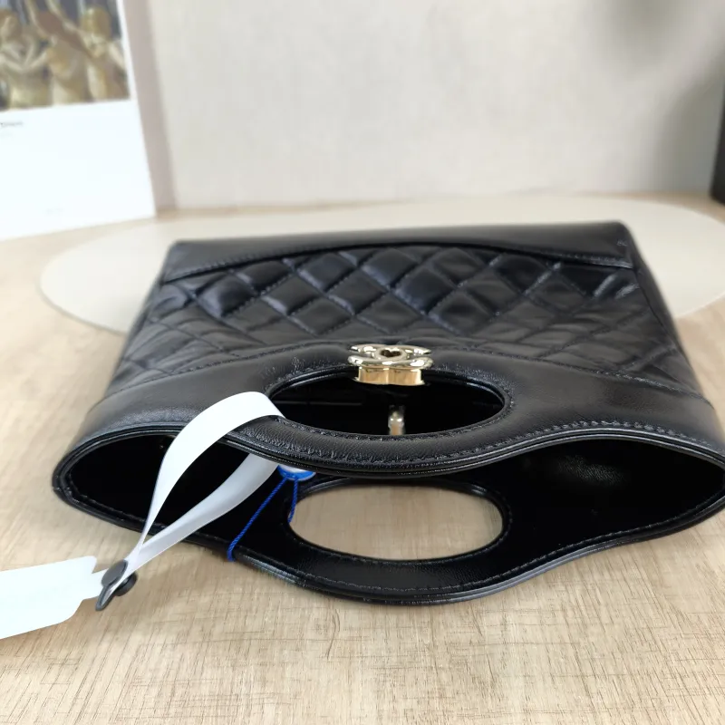 Chanel Crossbody Bag 31Bag Black Waxed Leather Mini 23 × 5.5 × 22 cm — detail view 1 of 13