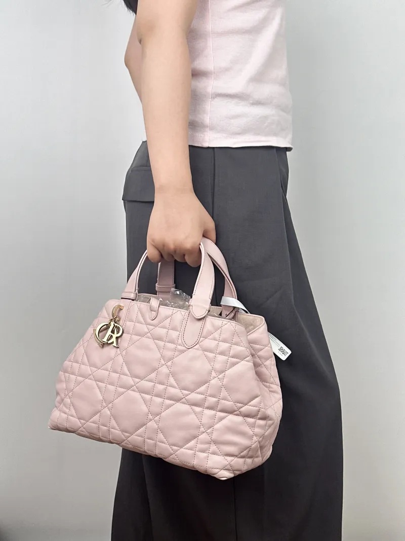DIOR Top Handle Bag TOUJOURS Pink Calfskin Medium28.5 × 17 × 21.5 cm — on-model view 1 of 2