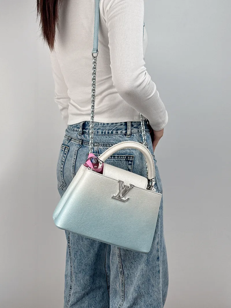 Louis Vuitton Top Handle Bag Capucines Calfskin BB 27 × 9 × 17.5 cm — on-model view 3 of 3