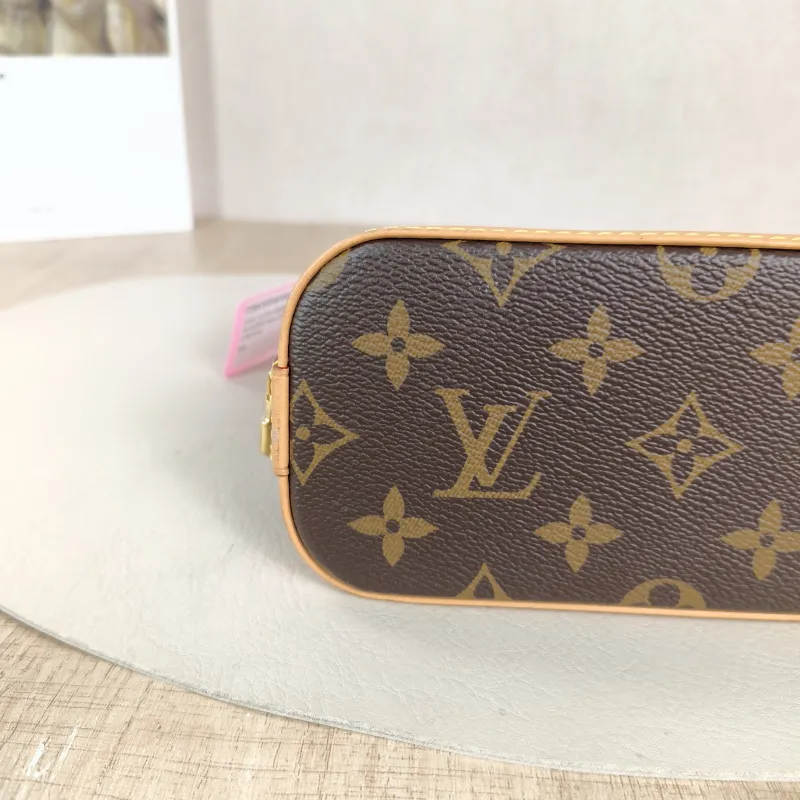 Louis Vuitton Crossbody Bag Alma Nano Monogram PVC nano 18 × 8 × 12 cm — detail view 4 of 10