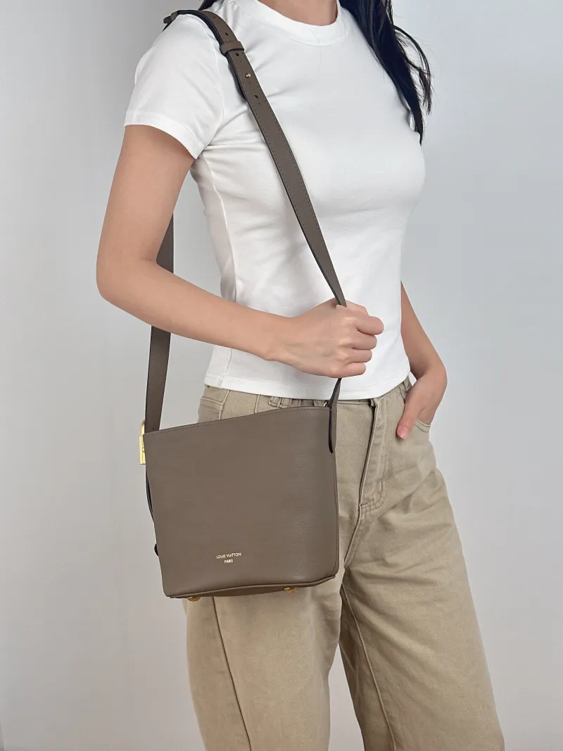Louis Vuitton Top Handle Bag LOW KEY ALL IN BB Calfskin BB 16 × 12 × 18 cm — on-model view 1 of 4