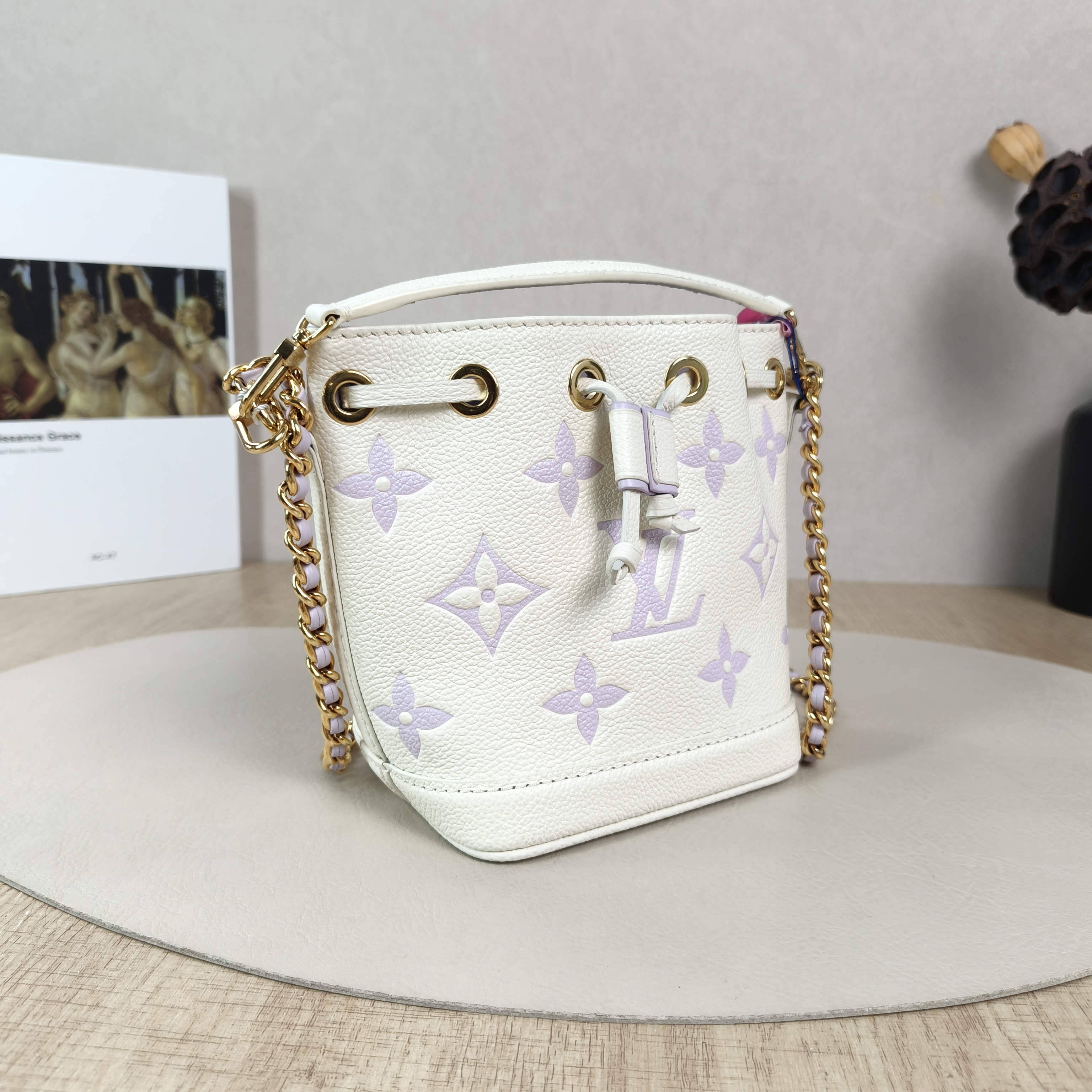 Louis Vuitton Crossbody Bag NANO NOÉ Bucket Bag Nano White · Empreinte Embossed Calfskin Monogramnano13 × 10 × 16 cm — cover view 3 of 5