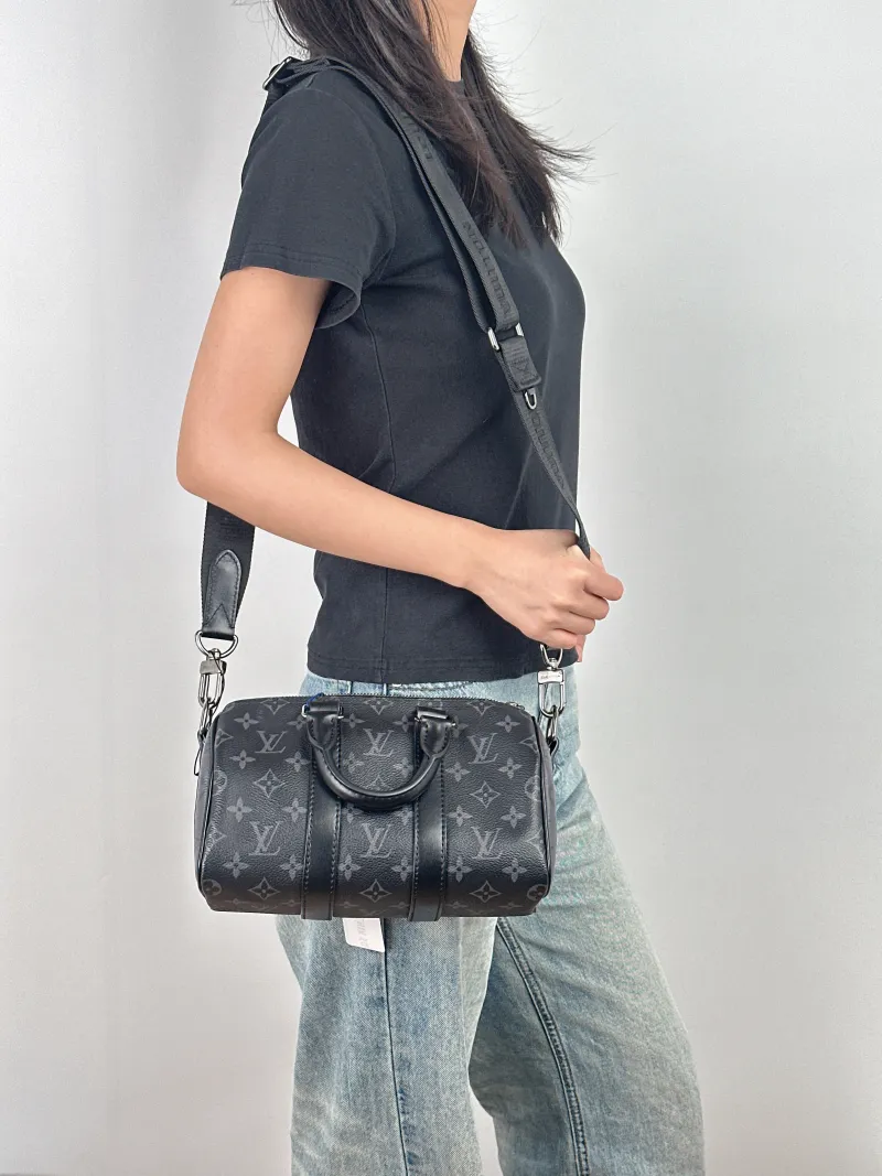 Louis Vuitton Crossbody Bag Keepall 25 PVC Medium 25 × 11 × 15 cm — on-model view 2 of 3