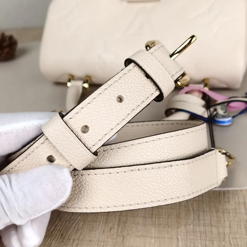 Louis Vuitton Crossbody Bag MADELEINE White Monogram Empreinte Embossed Calfskin BB 24 × 8.5 × 17 cm — detail view 5 of 14