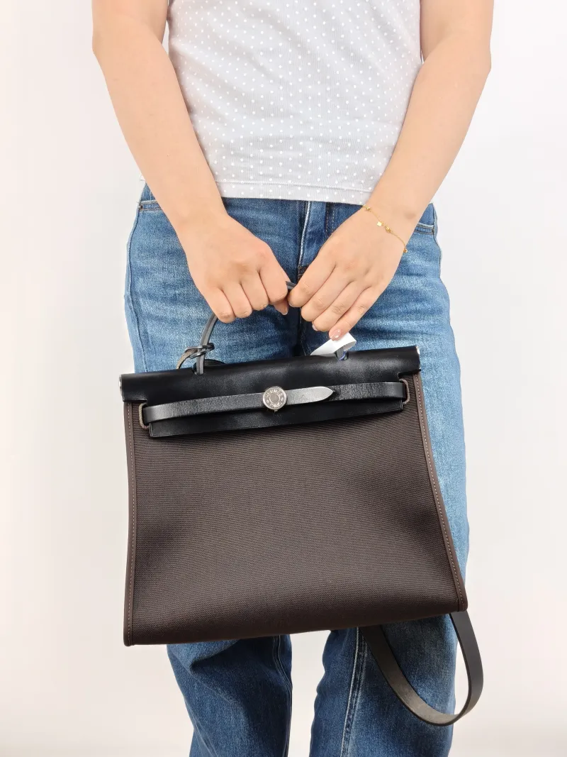 Hermès Shoulder Bag Herbag 31 Canvas Medium 30.5 × 11 × 25.5 cm Y — on-model view 1 of 2