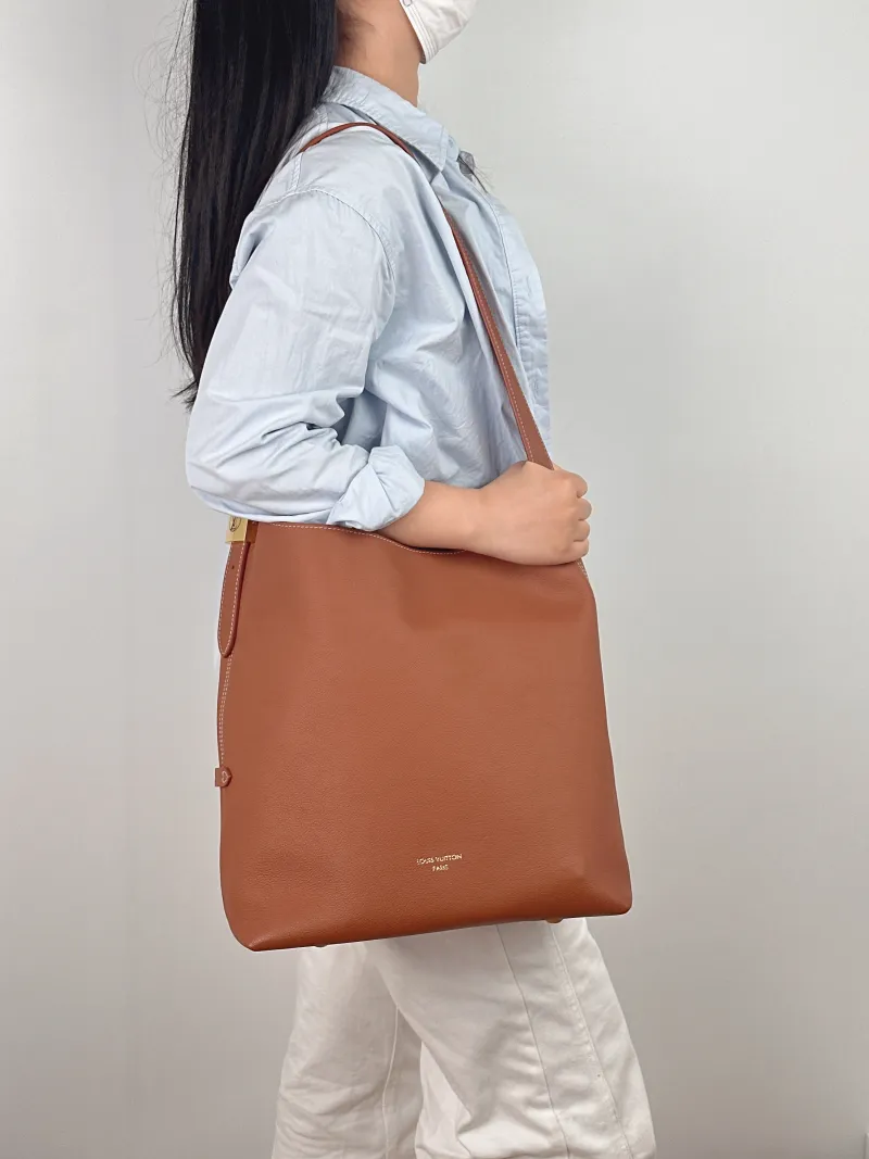 Louis Vuitton Shoulder Bag Low Key Hobo Shoulder Bag Calfskin Medium 31 × 18 × 35 cm — on-model view 2 of 2