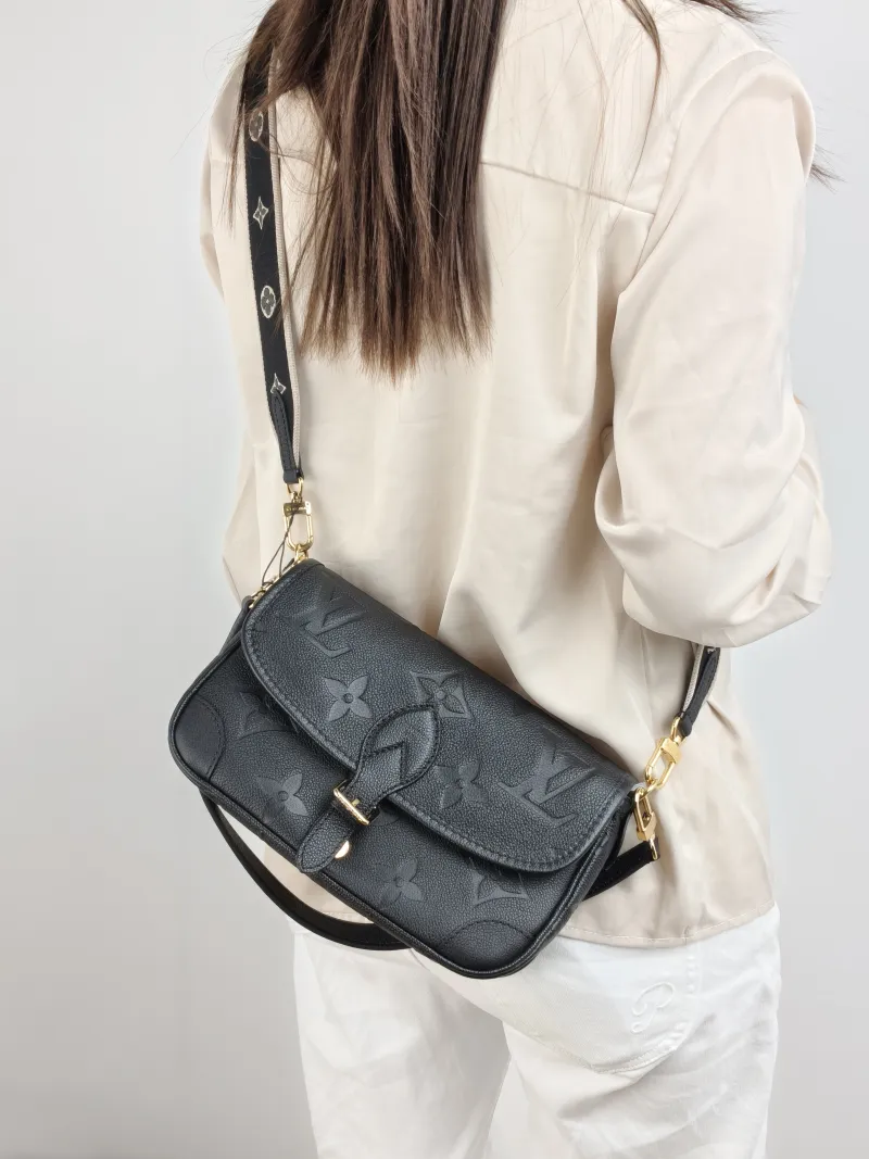 Louis Vuitton Crossbody Bag Diane Baguette Bag Black Monogram Empreinte Embossed Calfskin Small 24 × 9 × 15 cm — on-model view 2 of 2