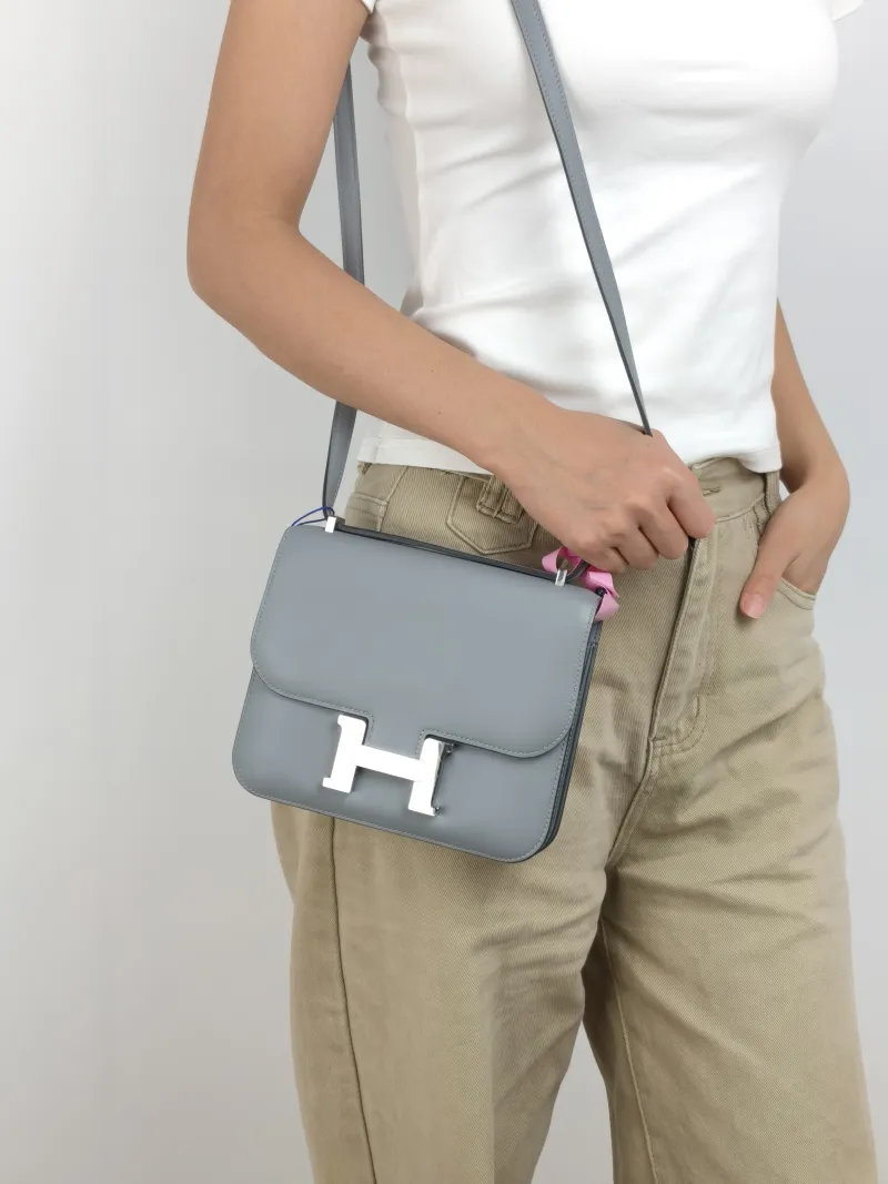 Hermès Crossbody Bag Constance 19 Silver-Tone Hardware Swift Calfskin Mini 19 × 4 × 15 cm K — on-model view 1 of 3