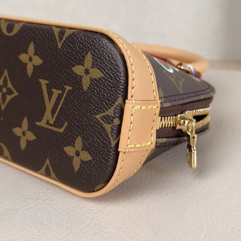 Louis Vuitton Crossbody Bag Alma Nano vivenne Monogram PVC nano 18 × 8 × 12 cm — detail view 8 of 11