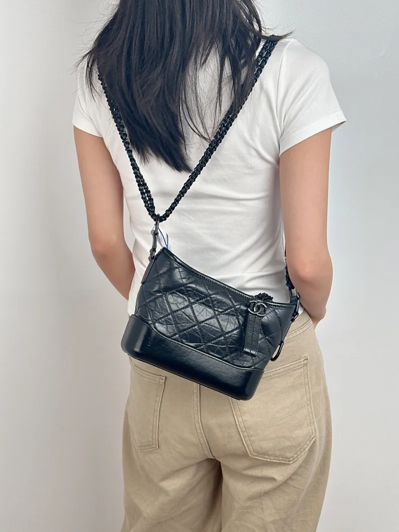 Chanel Crossbody Bag Gabrielle Gabrielle Bag Black Calfskin Small 20 × 8 × 15 cm 28 — on-model view 1 of 2