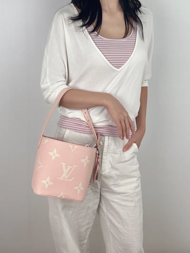Louis Vuitton Top Handle Bag ALL IN BB · White Empreinte Embossed Calfskin BB16 × 12 × 18 cm — on-model view 2 of 3