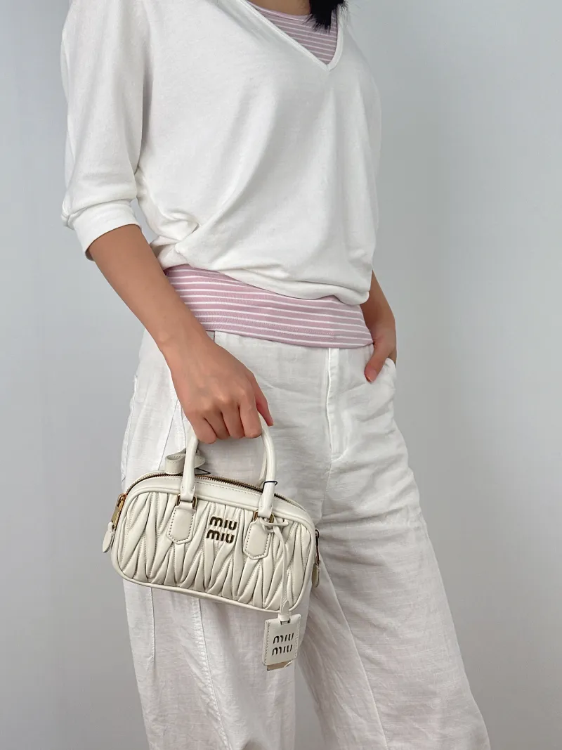 Miumiu Top Handle Bag Arcadie MatelasséCollection Edition White Lambskin mini19 × 5 × 10 cm — on-model view 3 of 3