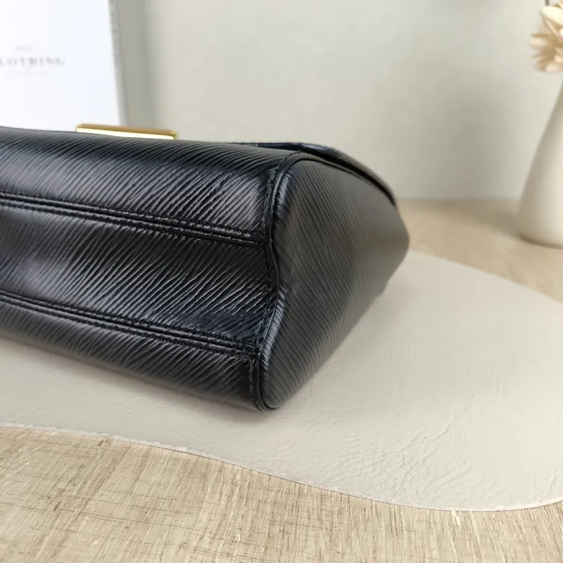 Louis Vuitton Crossbody Bag Twist Black Epi Embossed Calfskin Medium 23 × 9.5 × 17 cm — detail view 7 of 12
