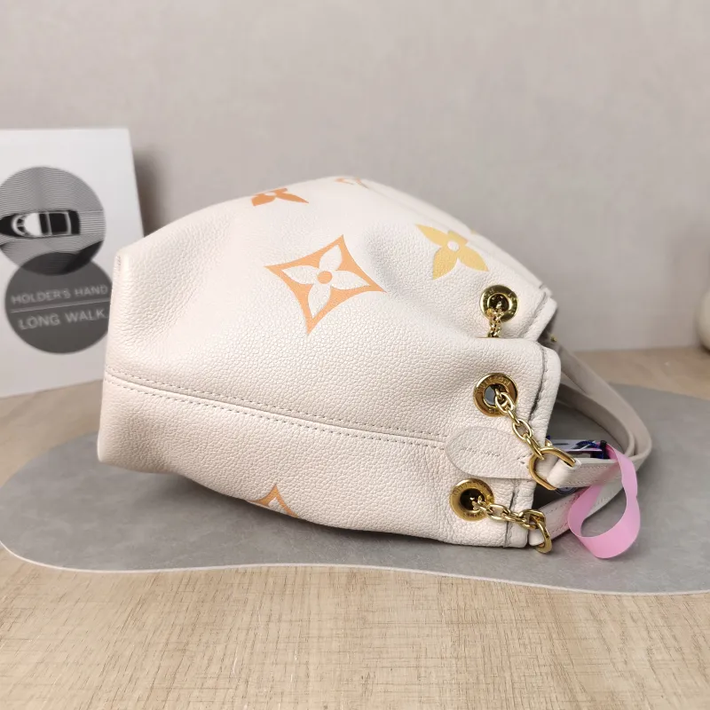 Louis Vuitton Crossbody Bag BUNDLE Beige Empreinte Embossed Calfskin Medium 28 × 11.5 × 20 cm — detail view 6 of 14