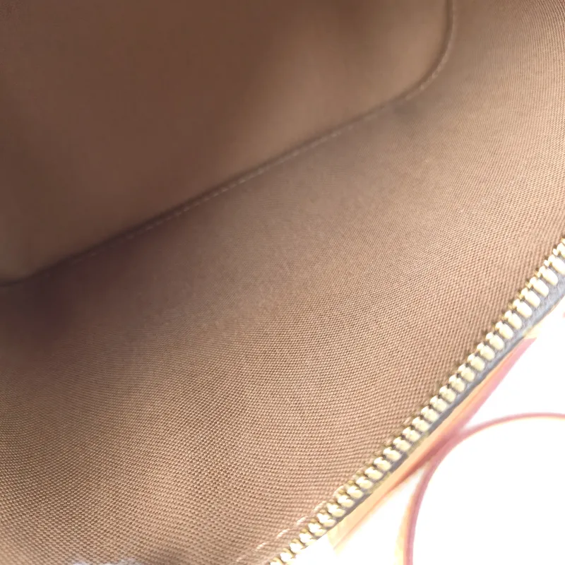 Louis Vuitton Crossbody Bag Alma BB Monogram PVC BB 23.5 × 11.5 × 17.5 cm — detail view 12 of 12