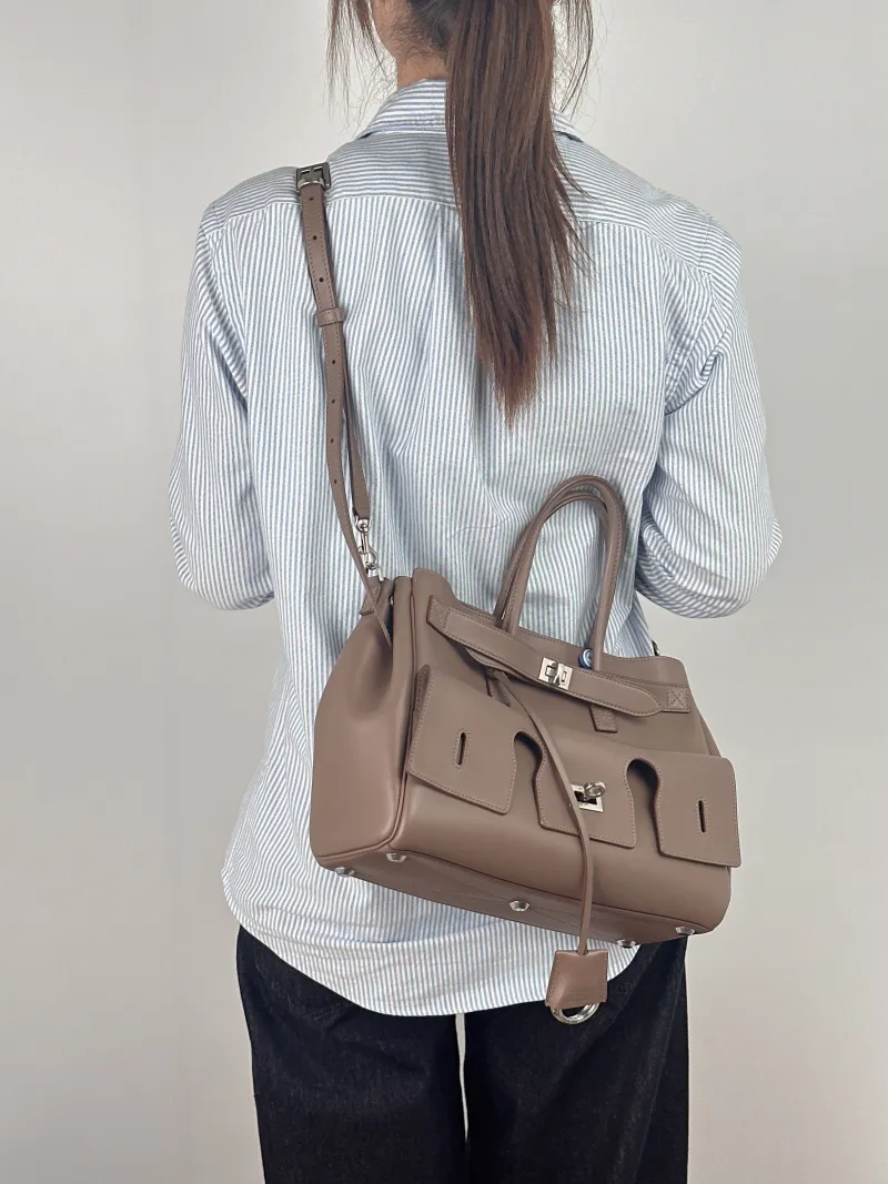BALENCIAGA Top Handle Bag Bel air Calfskin Small 30 × 12 × 20.5 cm — on-model view 2 of 3