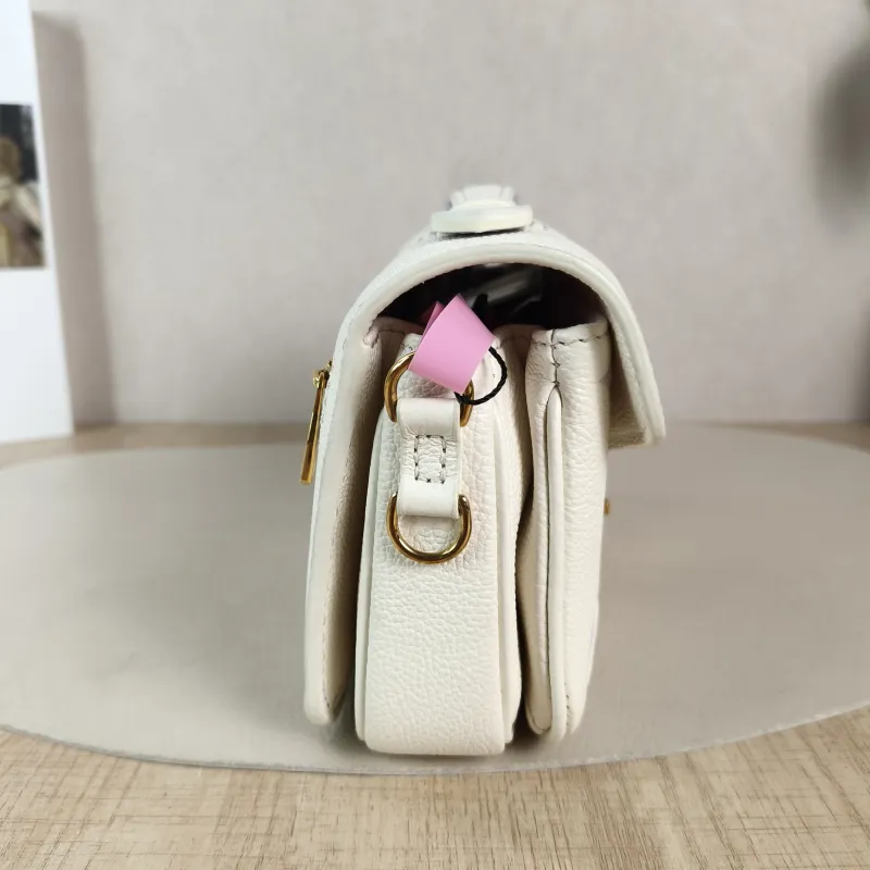 Louis Vuitton Crossbody Bag Pochette Métis East West White · Monogram Empreinte Embossed Calfskin Small 21.5 × 6 × 13.5 cm — detail view 8 of 11